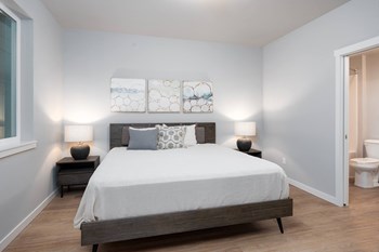 Bedroom at Village on Main Apartments